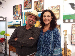 <p>Customers hamming it up in front of Dave Newman’s art work!
</p>