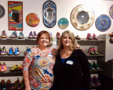 <p>JANET ALVILLAR (L) and VALERIE WATSON shown here in front of their amazing mosaic wall art.</p>