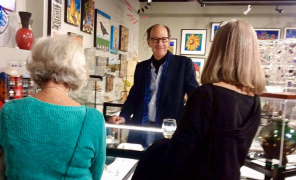 <p>The ever charming Kit Carson talking to guests about his jewelry.</p>