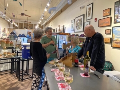 <p>Linda and John chatting it up with friends</p>