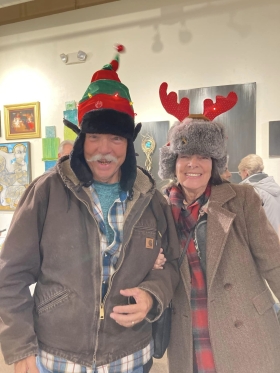 <p>What a fun and funny couple showing off their musical hats!</p>
