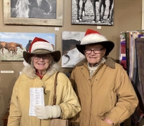 <p>Looking right at home admiring Jody Miller’s equine photography!</p>